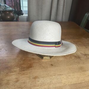 Vintage white straw sun hat with colorful striped ribbon